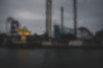 Rain on the window overlooking the theme park