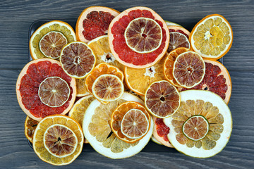 Dried slices of various citrus fruits