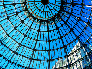Silhouette half top circle ceiling dome roof white steel structure architecture shadow, distributed line surround, transparent clear glass wall with reflection, bright blue sky, building background