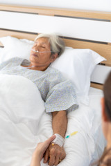 nurses check up on inpatient health elderly