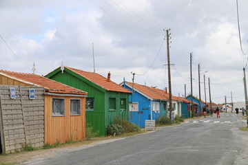 Fototapeta na wymiar Colourful houses along the road