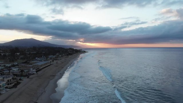  Sunrise Drone Jib Along Beach