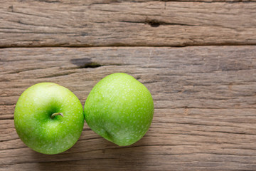 Fresh Green Apple on Wood