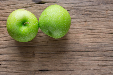 Fresh Green Apple on Wood
