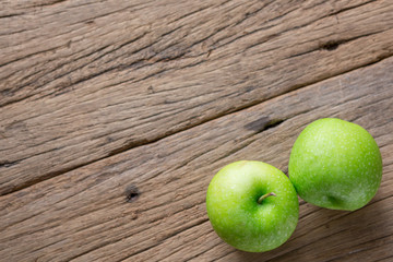 Fresh Green Apple on Wood