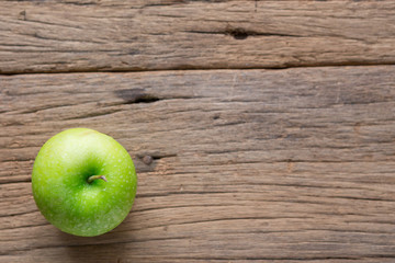 Fresh Green Apple on Wood