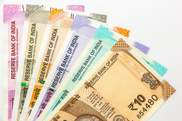 Close up view of brand new indian 10, 50, 100, 200, 500 and 2000 rupees banknotes. Colorful money...