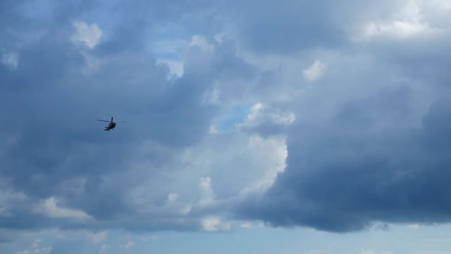Helicopter heading and landing on an offshore oil rig , service travel to oil and gas platform and drilling rig in offshore locations
