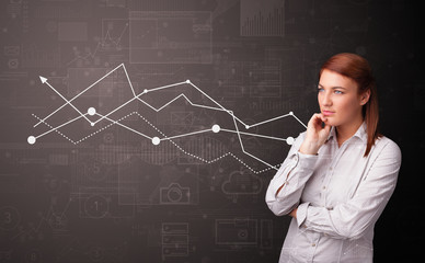 Young person standing with increasing graph concept
