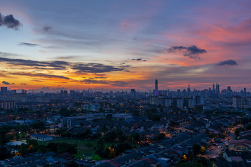 Fototapeta na wymiar Night view of downtown Kuala Lumpur, a capital of Malaysia. Its modern skyline is dominated by the 451m-tall Petronas Twin Towers. 