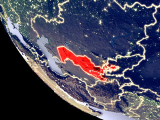 Orbit view of Uzbekistan at night with bright city lights. Very detailed plastic planet surface.