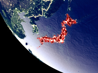 Orbit view of Japan at night with bright city lights. Very detailed plastic planet surface.