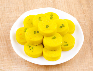 Indian Sweet Food Kesar Peda Also Know as Kesar Mawa Peda, Saffron Sweet, Saffron Peda, Pedha, Pera or Peday is a Saffron Flavoured Soft, Dense Sweet That is Specially Made During Festivals