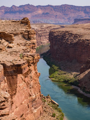 A Canyon of Flowing Water and Desert Landscapes