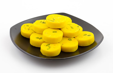 Indian Sweet Food Kesar Peda Also Know as Kesar Mawa Peda, Saffron Sweet, Saffron Peda, Pedha, Pera or Peday is a Saffron Flavoured Soft, Dense Sweet That is Specially Made During Festivals