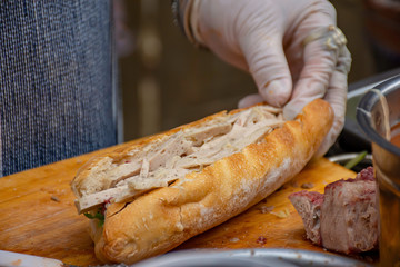 Baguette with meat and veggies and seasoning or Khowjee pate is popular original from France.