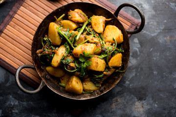 Aloo Palak sabzi - Potato cooked with spinach with added spices. a healthy Indian main course...