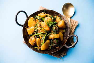 Aloo Palak sabzi - Potato cooked with spinach with added spices. a healthy Indian main course...