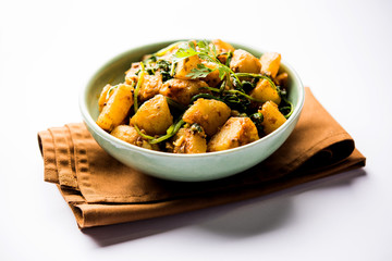 Aloo Palak sabzi - Potato cooked with spinach with added spices. a healthy Indian main course...