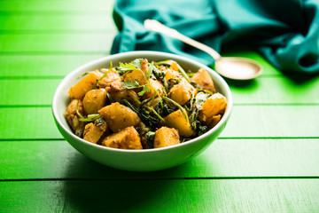 Aloo Palak sabzi - Potato cooked with spinach with added spices. a healthy Indian main course...