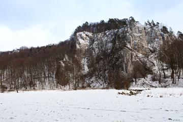 Fototapeta na wymiar A touristic trail in Ojców, Poland. Winter's landscape.