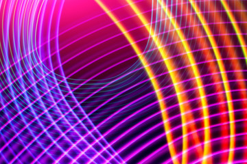 Abstract rainbow neon glowing crossing lines pattern. Dark  background of colorful neon glowing light shapes.