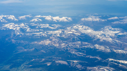 Obraz premium Mountain ranges, view from the plane. Window seat