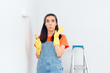 Woman Painting White Wall with Paint Roller