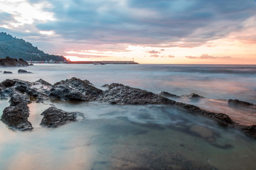 Obraz premium Long Exposure of the Mediterranean Coast of Southern Italy at Sunset