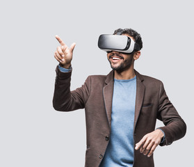 Young man using virtual reality headset. VR, future, gadgets, technology concept