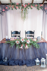 Festive table decorated with flowers