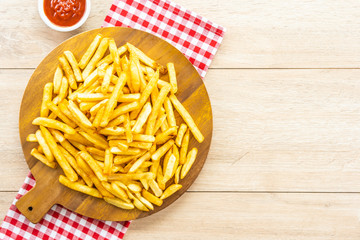 French fries with tomato or ketchup sauce