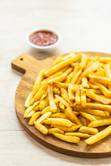 French fries with tomato or ketchup sauce