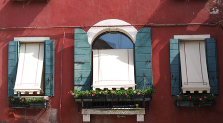 Murano, Venezia, Italy. Details of the windows of the traditional houses in Murano island