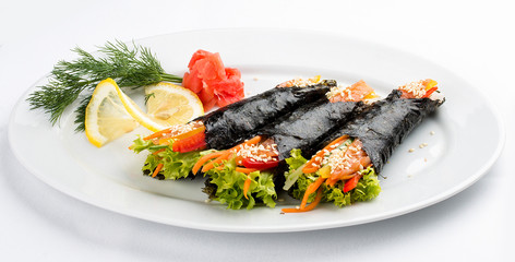 Temaki with salmon and vegetables on white background. Rolls in nori with a filling