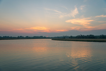 Fototapeta na wymiar sunset on Po river natural parck