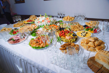 decoration of the festive buffet table, decorations and snacks, sweets and drinks