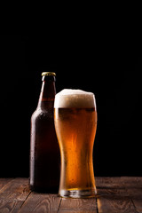Photo of buttle and glass of beer