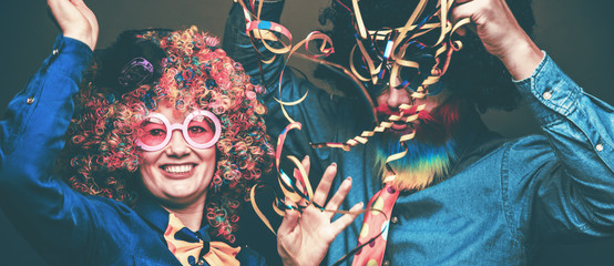 Portrait of party Men and woman in wig and glasses Carneval 