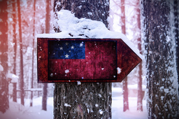 The Samoa flag attached to the tree as a sign.
