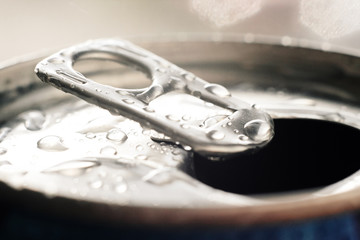 silver jar with refreshing soda on bokeh background