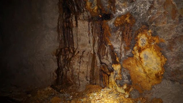 Uranium ore in a uranium mine. Rock containing uranium and barite.