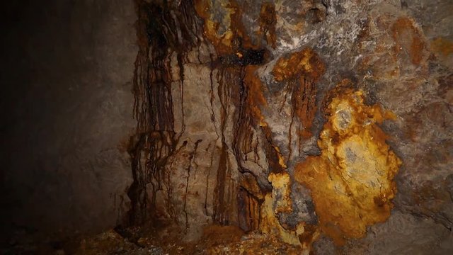 Uranium ore in a uranium mine. Rock containing uranium and barite.