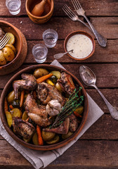 Oven baked rabbit with garlic sauce, copy space