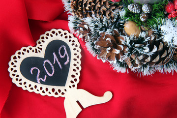 Christmas decoration and inscription on the heart of 2019