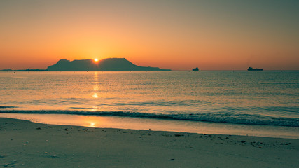 Amazing panoramic view on the rock of Gibraltar during sunset and the ships around it.