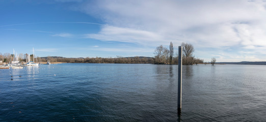Obraz premium Ticino river comes out of Verbano lake, Angera, Italy