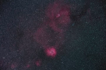 Selbstklebende Fototapete Universum Rosettennebel und Weihnachtsbaumhaufen