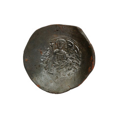 Concave ancient copper or bronze byzantine coin isolated on white