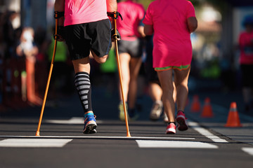 The body affected is running a marathon, amputation of the leg